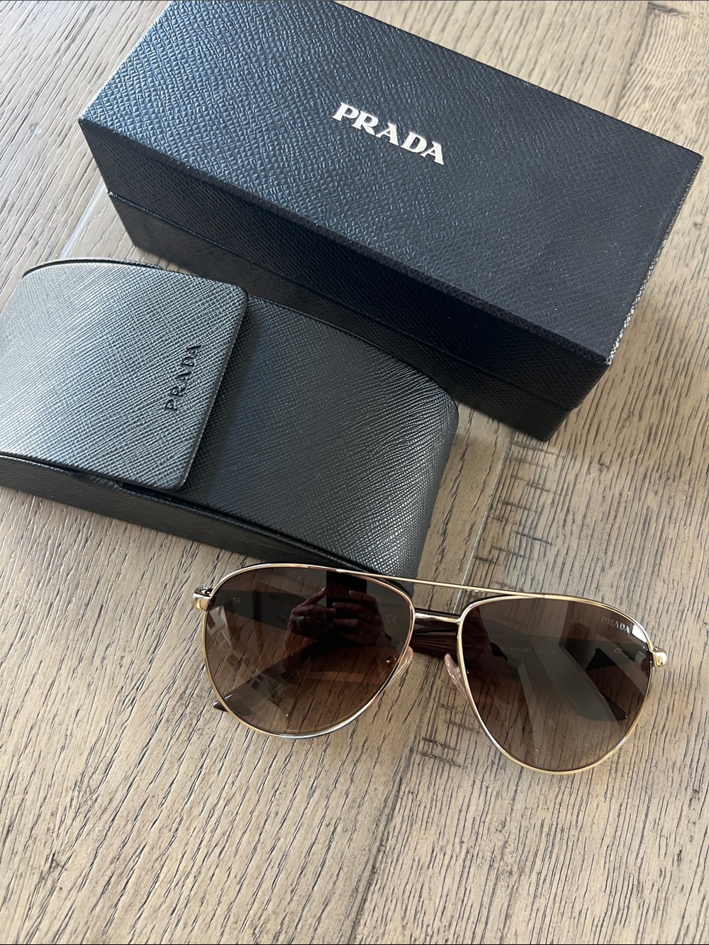 Prada Gold Frame Sunglasses with Brown Gradient Lenses
